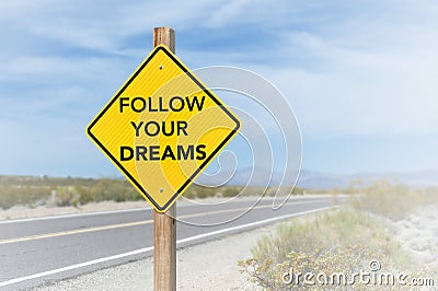 Follow your dreams road sign Stock Photo