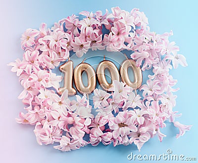 1000 followers card. Template for social networks, blogs. Background with pink flower petals Stock Photo