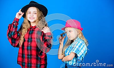 Following sister in everything. Cool cutie fashionable outfit. Happy childhood. Kids fashion concept. Check out our Stock Photo