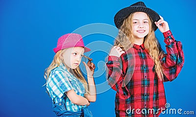 Following sister in everything. Cool cutie fashionable outfit. Happy childhood. Kids fashion concept. Check out our Stock Photo