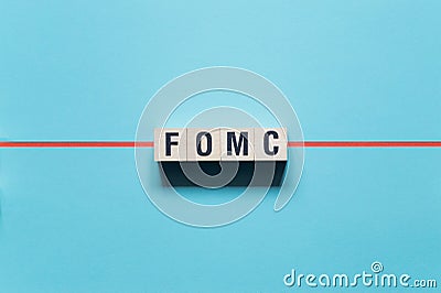 FOMC - Federal Open Market Committee word concept on cubes Stock Photo