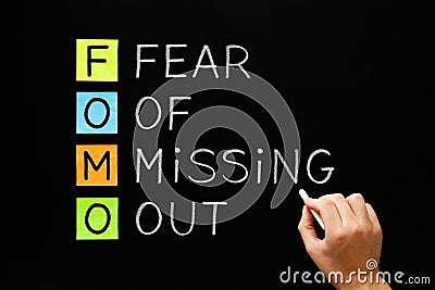 FOMO - Fear Of Missing Out Concept Stock Photo