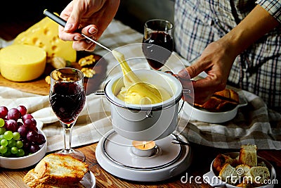 Fondue with croutons Stock Photo