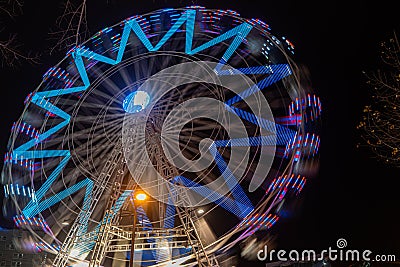 Fonte Nova`s garden with Christmas market and colored ferris wheel near Ria de Aveiro at night Stock Photo