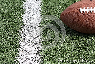 Fooball near the yardline with room for copy Stock Photo