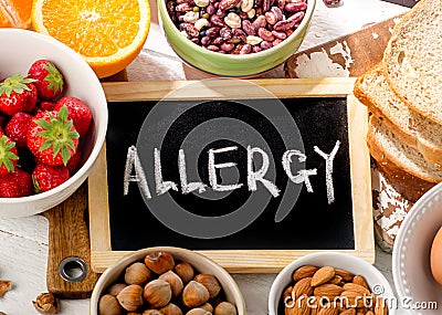 Food allergy. Allergic food on wooden background. Stock Photo