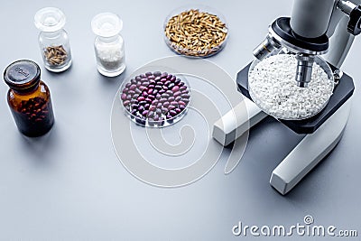 Food analysis. Rice under the microscope on grey background copyspace Stock Photo
