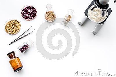 Food analysis. Rice under the microscope on white background top view copyspace Stock Photo