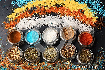 Food art concept. Glass jars with paprika, mustard and oregano Stock Photo