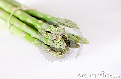 Food background asparagus flat lay pattern. bunch of fresh green asparagus on white background, top view Stock Photo