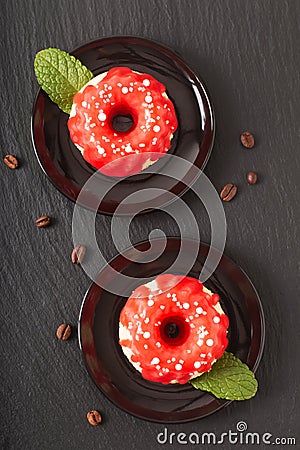 Food bakery concept homemade summer red berry sponge cake on black slate stone plate Stock Photo