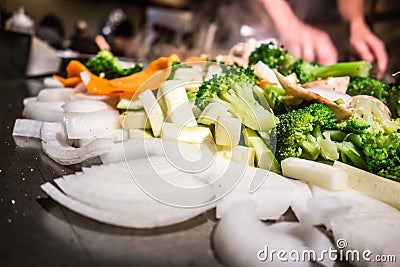 Food being brepared at japanese steakhouse Stock Photo