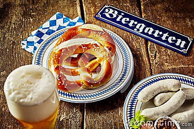 Food and beverage in a beer garden at Oktoberfest Stock Photo