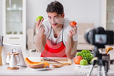 The food blogger working in the kitchen Stock Photo