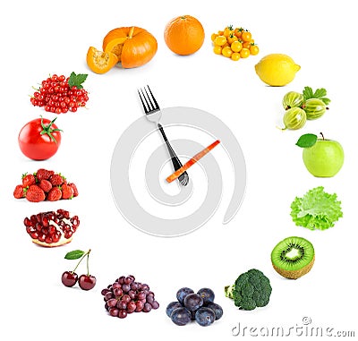 Food clock with fresh fruits and vegetables on white Stock Photo