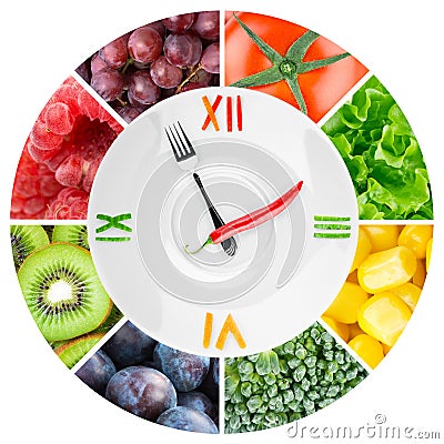 Food clock with vegetables and fruits Stock Photo