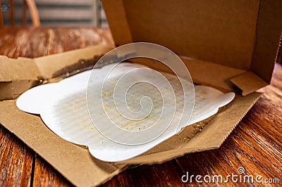 Food contaminated nonrecyclable cardboard pizza box Stock Photo