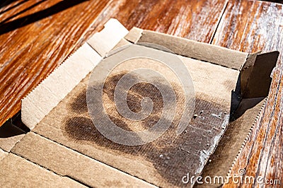 Food contaminated nonrecyclable cardboard pizza box Stock Photo