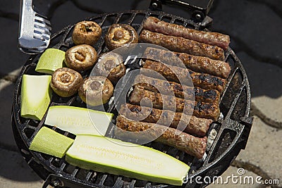 The food is cooked on the grill. Stock Photo