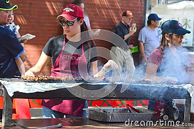 Food cooking at Chinatown Summer Fair Editorial Stock Photo