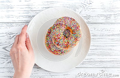 Food design with donat on plate on table background top view Stock Photo