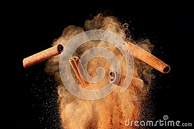 Food explosion with cinnamon sticks and powder Stock Photo