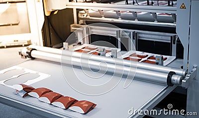 Food folding packaging process on digital cutting machine Stock Photo