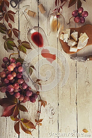 Food frame with wine, grapes and cheese Stock Photo