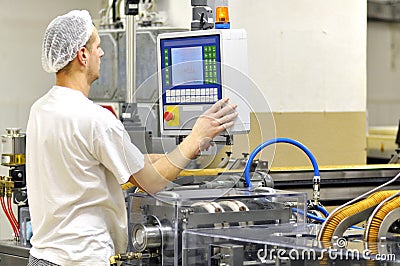 Food industry - biscuit production in a factory on a conveyor be Stock Photo