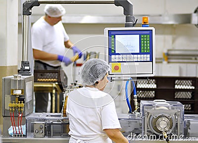 Food industry - biscuit production in a factory on a conveyor be Stock Photo