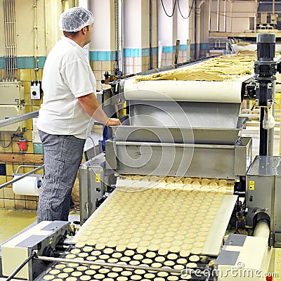 Food industry - biscuit production in a factory on a conveyor be Stock Photo