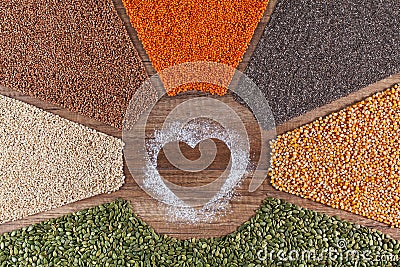 Food with love - plant based diversified diet concept with colorful grains and seeds Stock Photo