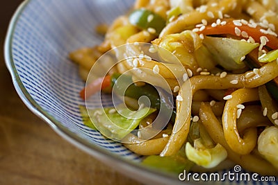 Food photography of the Japanese dish yaki udon in an asian bowl Stock Photo