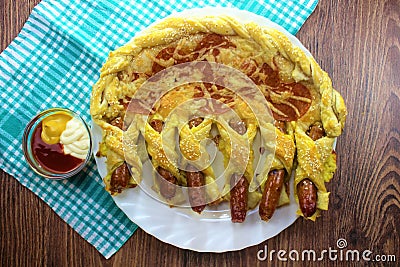 Fantastic food pizza pepperoni roll and sausage rolls with mozzarella cheese and sesame seeds on top Stock Photo