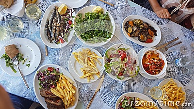 Food plates on a table top view greek food on summer greece Stock Photo