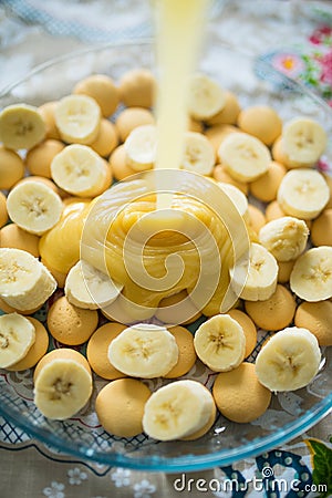 A food preparation action shot with bananas and toffee Stock Photo