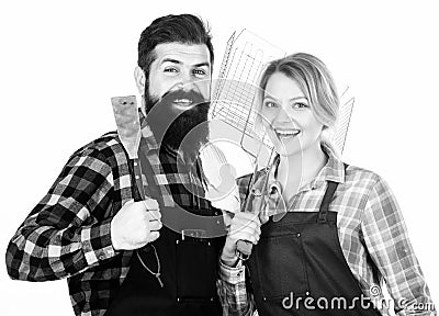 Food preparation. Family weekend. Man bearded hipster and girl. Preparation and culinary. Tools for roasting meat Stock Photo