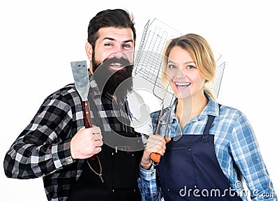 Food preparation. Family weekend. Man bearded hipster and girl. Preparation and culinary. Tools for roasting meat Stock Photo