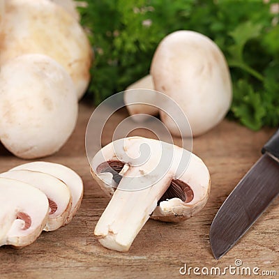 Food preparation: Sliced mushrooms on a chopping board Stock Photo