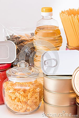 Food Reserves: Canned Food, Spaghetti, Tomato Juice, Pasta and Grocery Stock Photo