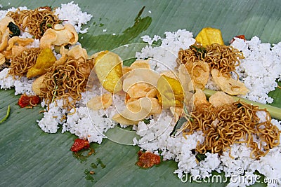food served on banana leaves, to eat together. one form of togetherness in the village. pleasant. Stock Photo