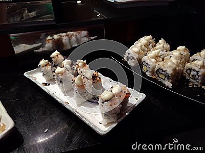 Japanese rolls on plates Stock Photo