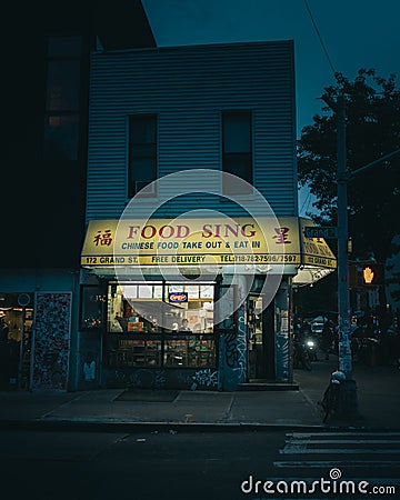 Food Sing Chinese restaurant sign at night, in Williamsburg, Brooklyn, New York Editorial Stock Photo