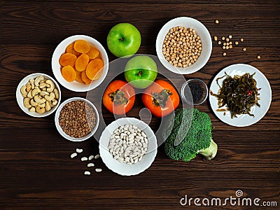 Food sources of iron on a dark background top view. Healthy food. Vegan Stock Photo