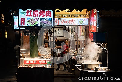 Food stall operating at night Editorial Stock Photo