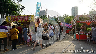 Food stalls in Ueno park attracted families Editorial Stock Photo