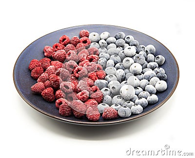 Food style white Tasty frozen blueberries organic plate Stock Photo