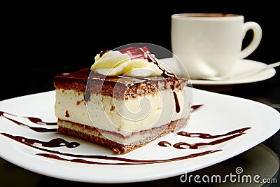 Food of sweet creamy chocolate cake with coffee. Stock Photo
