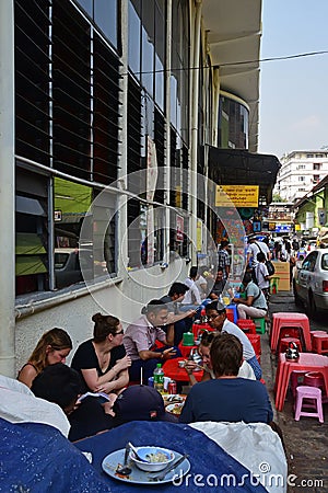 Food vendor stall at the side of the main building of Bogyoke Market at Bo Gyoke Road, Yangon, Myanmar Editorial Stock Photo