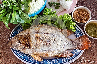 Food wrapped in leaves and Grilled Ruby Fish. Stock Photo